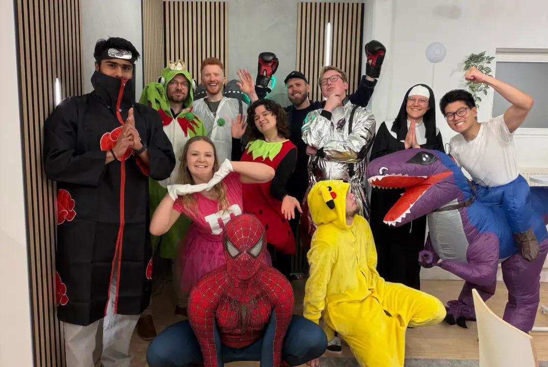 The meinGPT team in carnival costumes
